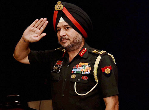 Director General Military Operations (DGMO), Ranbir Singh salutes after a Press Conferences in New Delhi on Thursday. India conducted Surgical strikes across the Line of Control in Kashmir on Wednesday night. PTI Photo