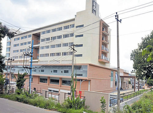 The Shamanur Shivashankarappa Hospital has encroached on 22 guntas of wasteland in Rajarajeshwari Nagar and actor Darshan's house. DH FILE PHOTO