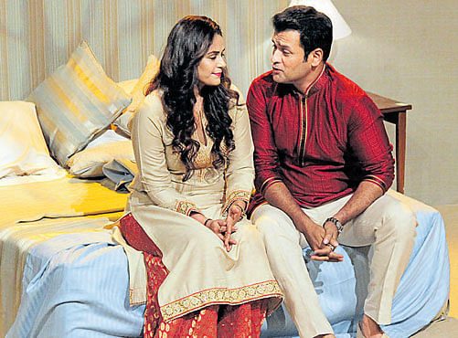 Engaging Mona Singh and Rohit Roy in a scene from 'Unfaithfully Yours'.