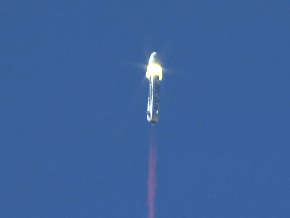 Forty-four seconds into the flight, the capsule popped off like a champagne cork, propelled by an escape motor mounted underneath. Not only did the capsule land safely under parachutes following liftoff, the rocket managed to fly back and land upright. Reuters photo