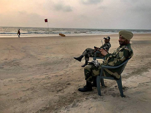 Security personnel keep vigil at a beach in Goa on Friday. A multi-tier security apparatus has been deployed in Goa for the BRICS Summit. PTI Photo