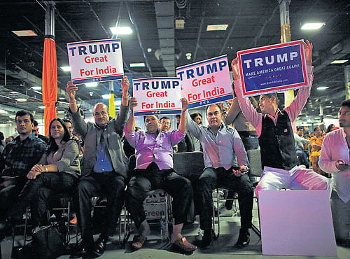 IN SUPPORT: People hold posters at the Republican Hindu Coalition's event organised byits chairman Shalabh Kumar(inset) on Saturday in NewJersey.Trump has unwittingly fashioned a niche constituency in the overlap between the Indian right and the American right. NYT
