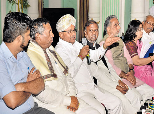Union Minister for Social Justice and Empowerment Tawar Chand Gehlot addresses a press meet in Mysuru, on Monday. MPs Prathap Simha and K H Muniyappa, State Minister for Social Welfare H Anjaneya, Union Minister of State for Social Justice and Empowerment Krishan Pal Gurjar and Social Justice Secretary Anita Agnihotri are seen. DH PHOTO