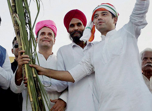Rahul's 'message', conceptualised by Congress poll strategist Prashant Kishor, is part of the party's mega farmer outreach programme 'Karza Kurki Khatam-Fasal Di Poori Rakam' where it promises farmers, who sign 'Maang Patr' (debt waiver form), that their loans will be waived if it forms the government in the state. PTI file photo