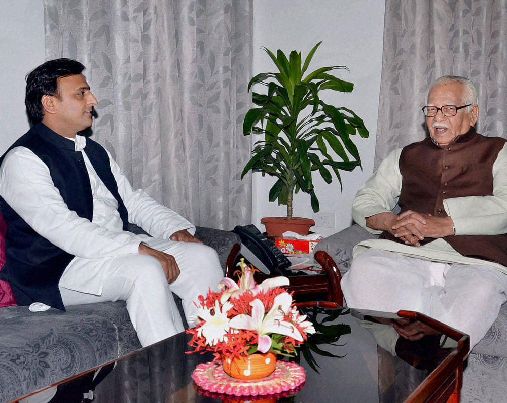 Uttar Pradesh Chief Minister Akhilesh Yadav meeting Governor Ram Naik in Lucknow on Wednesday. PTI Photo