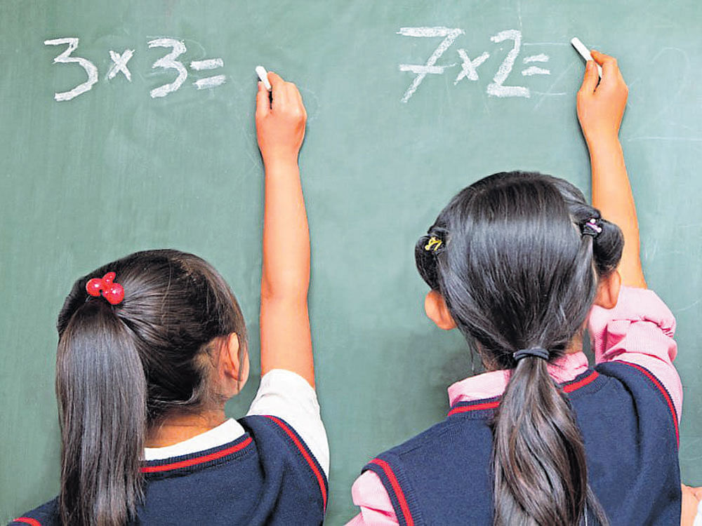 Beginning in early elementary school, boys outperform girls in math especially among the highest achievers continuing a troubling pattern found in the late 1990s, researchers said. File photo
