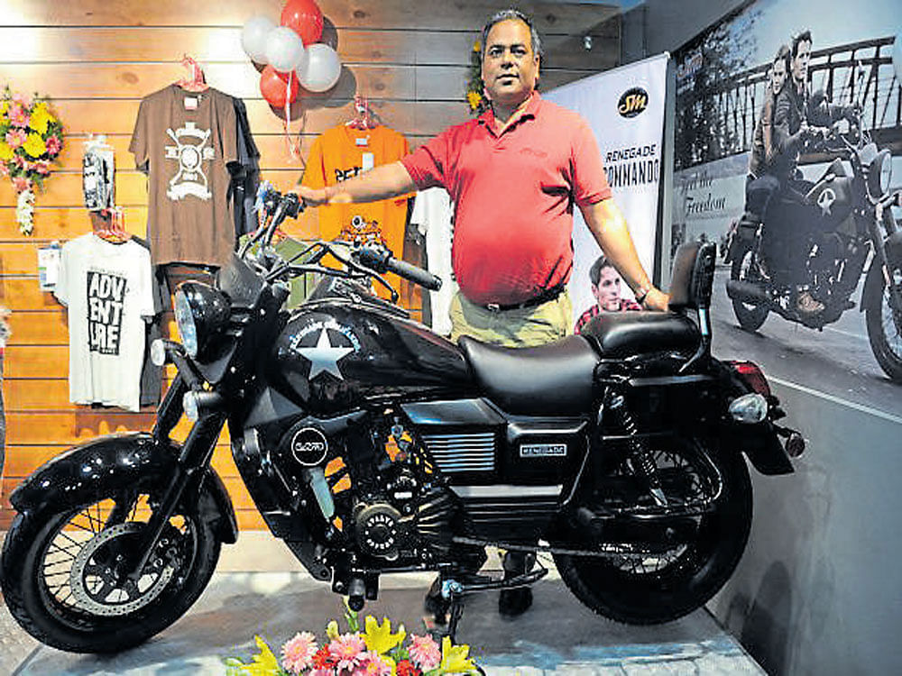 UML Director Rajeev Mishra with the Renegade Commando at the company's new outlet in Bengaluru. DH&#8200;Photo