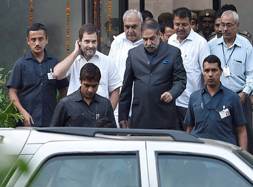 Congress Vice President Rahul Gandhi with party leaders Anand Sharma and Bhupinder Singh Hooda coming out of Mandir Marg Police Station after his release in New Delhi on Wednesday. Gandhi was detained while trying to enter RML Hospital to meet the family of ex-serviceman Subedar Grewal who allegedly committed suicide over OROP issue. PTI Photo