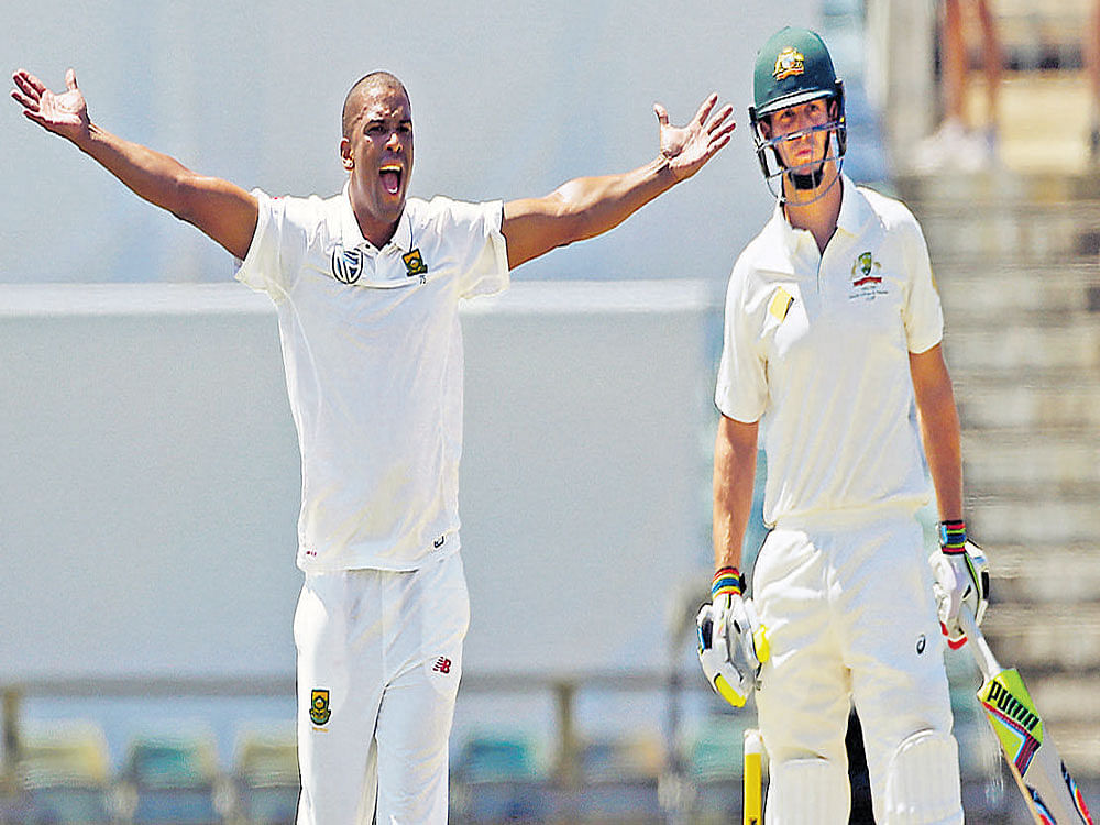 STRIKE FORCE: South Africa's Vernon Philander (left) successfully appeals for a LBW verdict against Mitchell Marsh in Perth on Friday. REUTERS