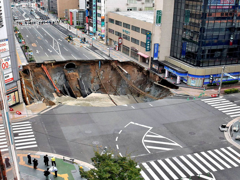 massive shinkhole is created in the middle of the business district in Fukuoka, southern Japan. AP/PTI