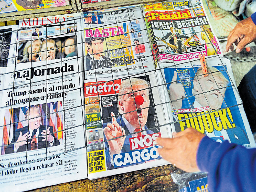 uncertainty looms: Newspapers in Mexico City announce Donald Trump's election as the US President. Even as the Mexican peso fell 13% after the election, its biggest drop in decades, Trump's success seemed to presage a new era of Mexico's confrontation with the US. AFP