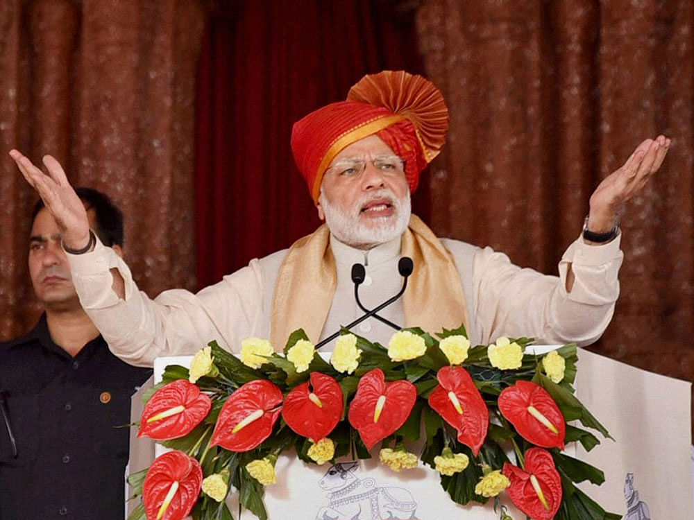 Prime Minister Narendra Modi addresses at Karnataka Lingayat Education Society Centenary Celebrations in Belagavi, Karnataka on Sunday. PTI Photo