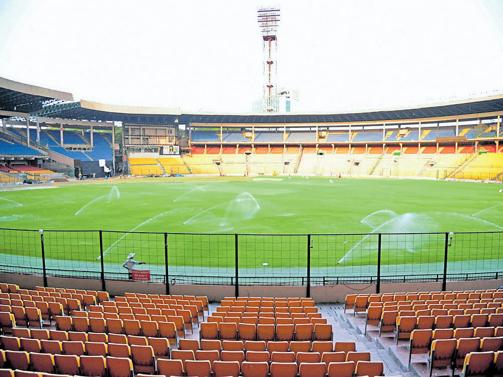 Facelift: The Chinnaswamy Stadium outfield bears a lush look after five months of renovation work. DH PHOTO