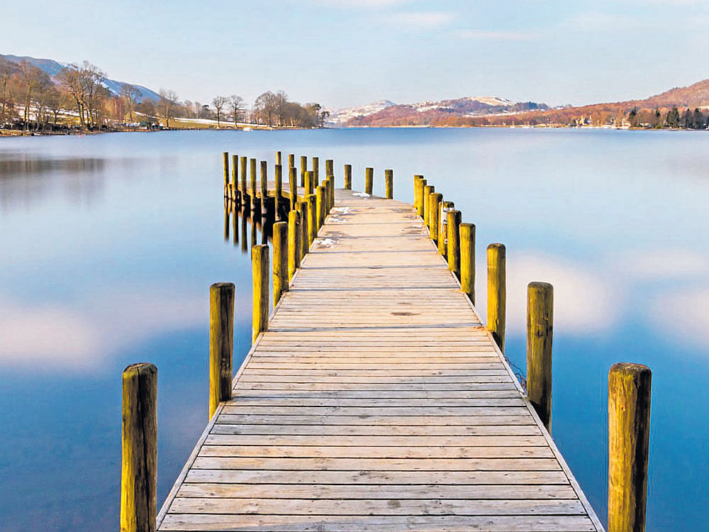 wondrous waterbody A peaceful pier on Coniston Water, a ribbon lake situated in a U-shaped valley, formed by glaciation during the last Ice Age.
