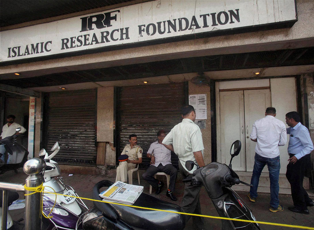 National Investigation Agency (NIA) team and Mumbai Police raids the Islamic Research Foundation office headed by Zakir Naik at Dongri in Mumbai on Saturday. PTI file Photo