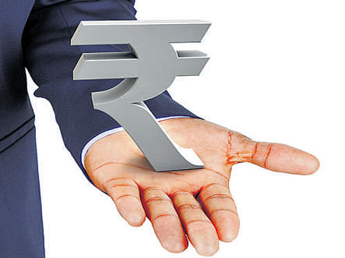 The rupee marked its lowest value of 68.85 against the dollar in August 2013.  File Photo.
