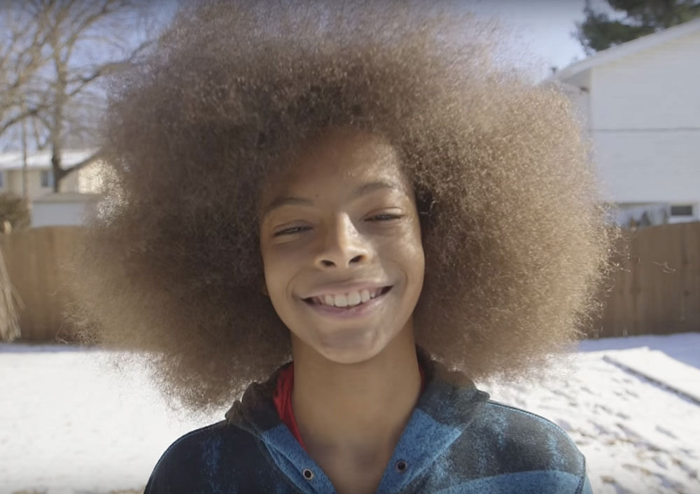 Tyler was inspired to grow his Afro after seeing a photo of his father as a young boy in the 1970s. Guinnes World Record video grab