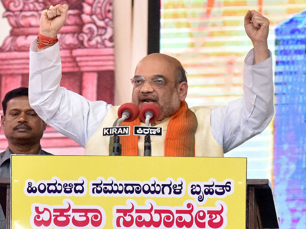 BJP National President Amit Shah addressing at the state level convention of BJP OBC communities at Palace Ground in Bengaluru on Sunday. DH Photo.