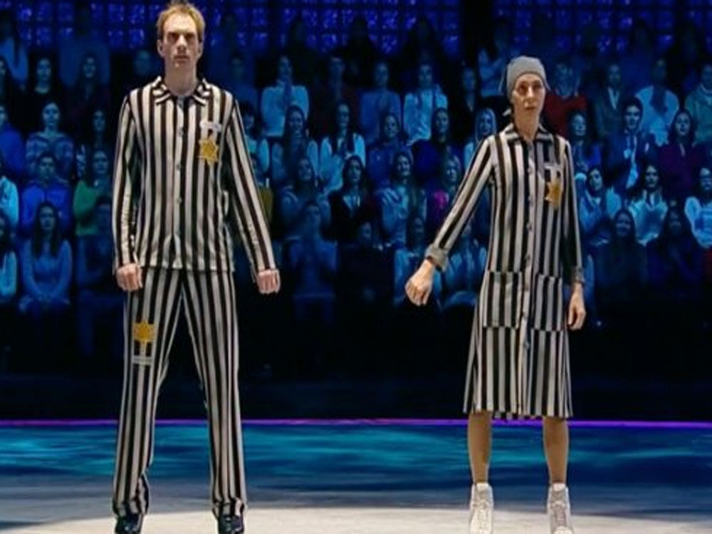 The dancers wore black-and-white striped outfits with numbers and yellow stars for the routine, which ends to the sound of gunfire. The routine was set to a song from 1997 Oscar-winning Italian film Life is Beautiful, a tragicomedy about a father trying to hide the horrors of concentration camp life from his son. Picture courtesy Twitter