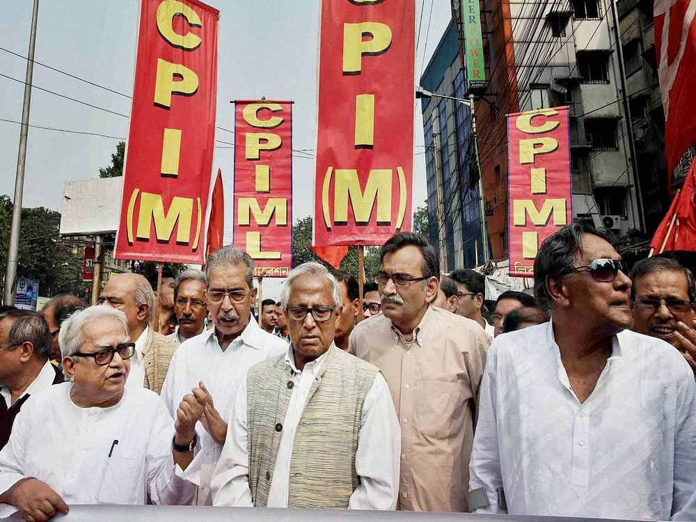 Left Front Chairman Biman Bose with other Left leaders taking out a rally during their nationwide strike against demonetisation in Kolkata on Monday. PTI Photo