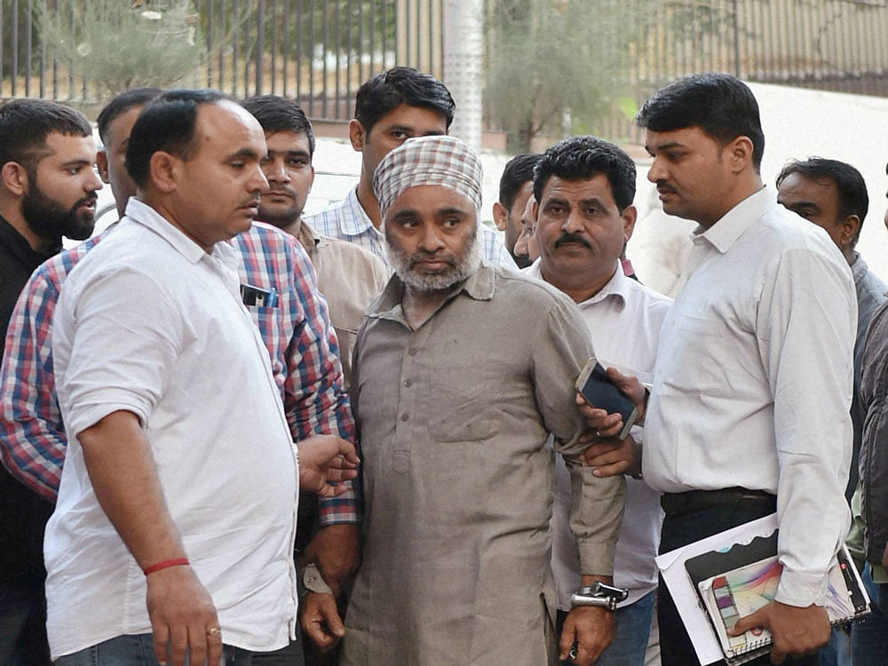KLF chief Harminder Singh Mintoo being produced at Patiala House Court in New Delhi on Monday. PTI