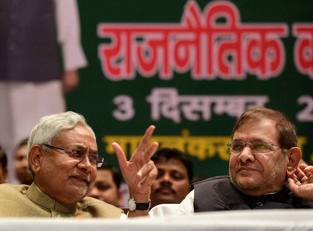 Bihar Chief Minister and JD(U) National President Nitish Kumar with senior party leader Sharad Yadav during the party's Karyakarta Sammelan in New Delhi on Saturday. PTI Photo
