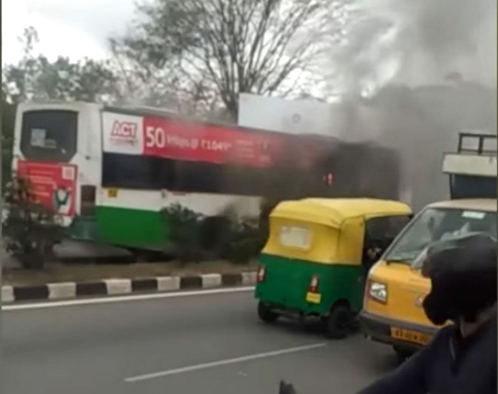 As the bus was heading to Srirangapatna, the driver noticed smoke from the engine soon after which he stopped the vehicle and asked the children to deboard before it caught fire, police said. Screen Grab