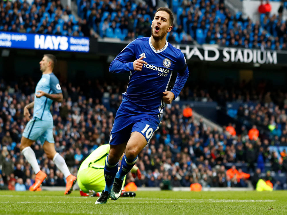 Chelsea's Eden Hazard celebrates scoring their third goal. Reuters Photo.
