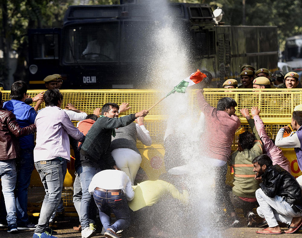 Police use water cannon to disperse Delhi BJP Workers during protest a against the Delhi Chief Minister Arvind Kejriwal in New Delhi on Saturday.
