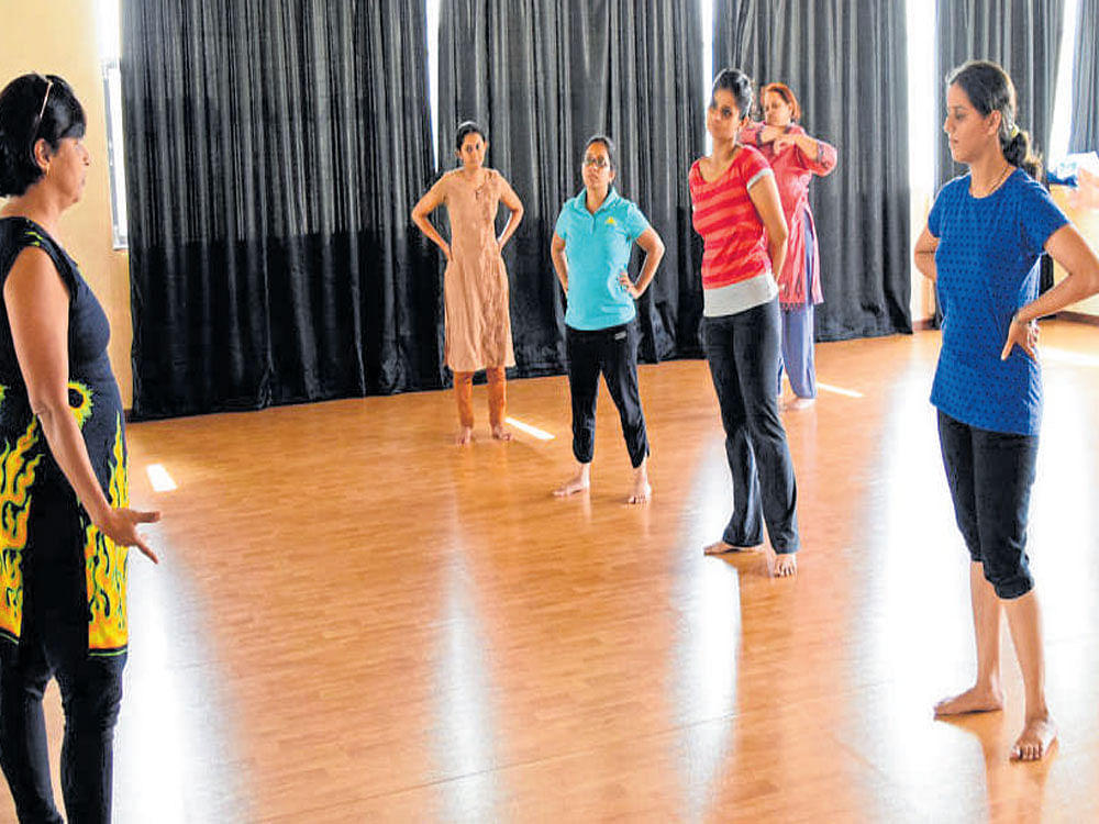 Tripura Kashyap (extreme left, leading the group) during one of her dance therapy sessions