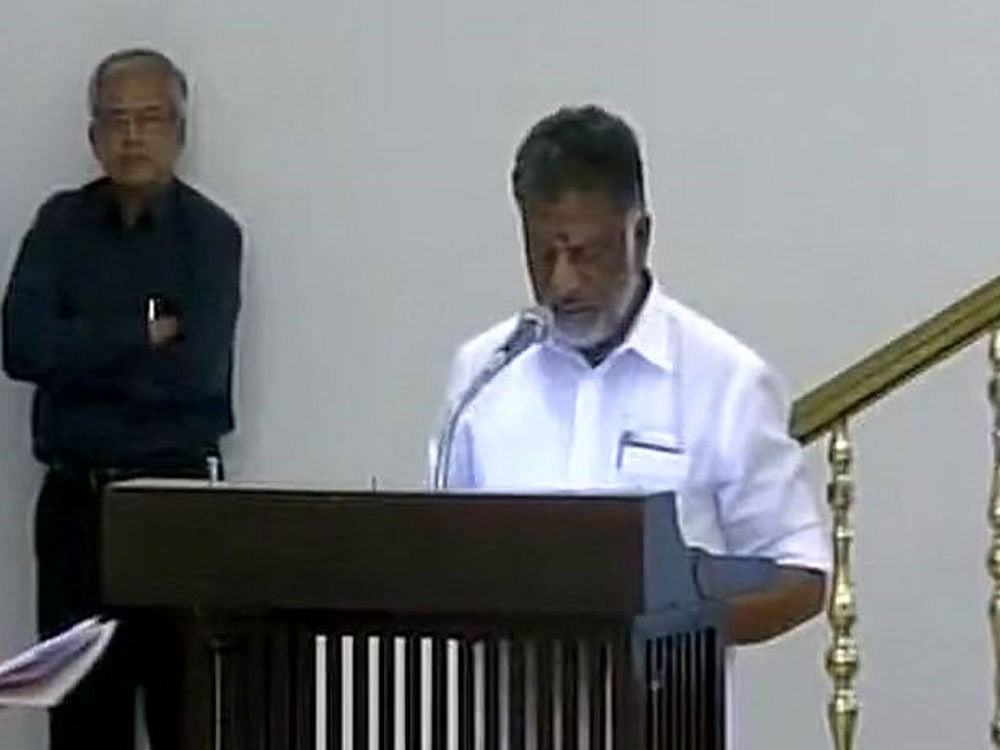 A grim-faced Panneerselvam, who was also seen sporting a beard, was sworn in around 1.15 AM by Governor Ch Vidyasagar Rao at the Raj Bhavan amidst a scene of gloom. Picture courtesy ANI