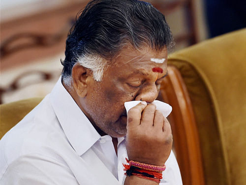 OPS breaks down as PM pays floral tributes to Jaya. PTI file photo