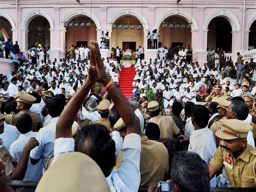 People paying their last respects to Tamil Nadu's former Chief Minister Jayaram Jayalalithaa kept for public viewing at Rajaji Hall in Chennai on Tuesday. PTI Photo