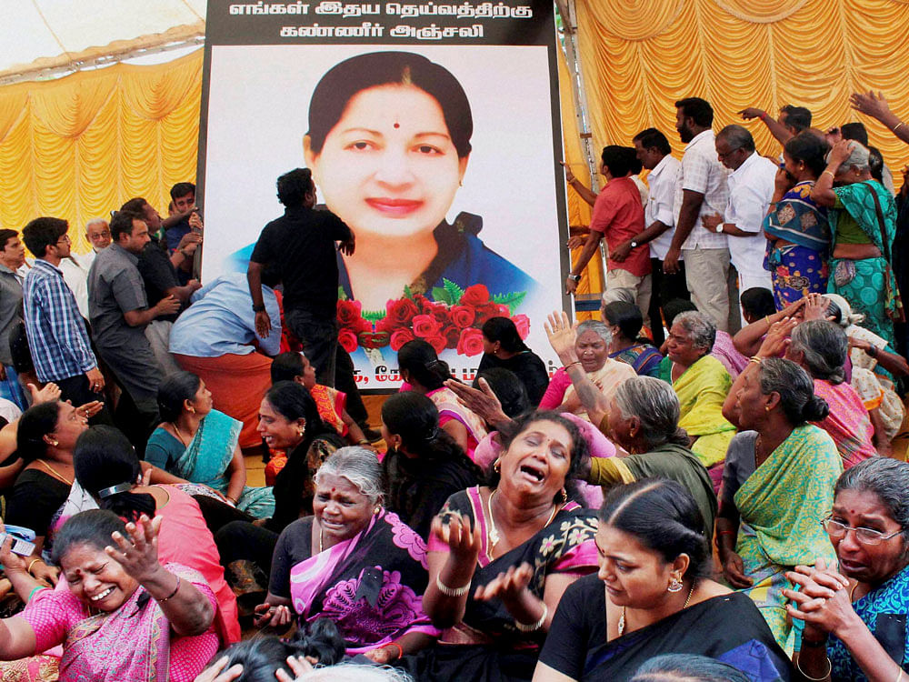 AIADMK members pay tribute, and grieve the loss of their beloved leader, Former Chief Minister, J Jayalalitha who passed away yesterday, in Coimbatore on Tuesday. PTI Photo