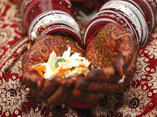 The 16-year-old girl, whose wedding had been 'fixed' on Thursday, came to the police station to complain that her parents were trying to marry her off by force but she wanted to continue with her studies, officer-in-charge of Sonari police station Amish Hussain said. Her parents too reached the police station from their Budhram Mohalla home and started reprimanding the girl who then had a heated exchange of words with her mother. Reuters file photo for representation only