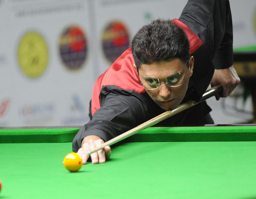 GOING STRONG: India's Dhruv Sitwala in action at the KSBA hall on Tuesday. DH PHOTO/SRIKANTA SHARMA R