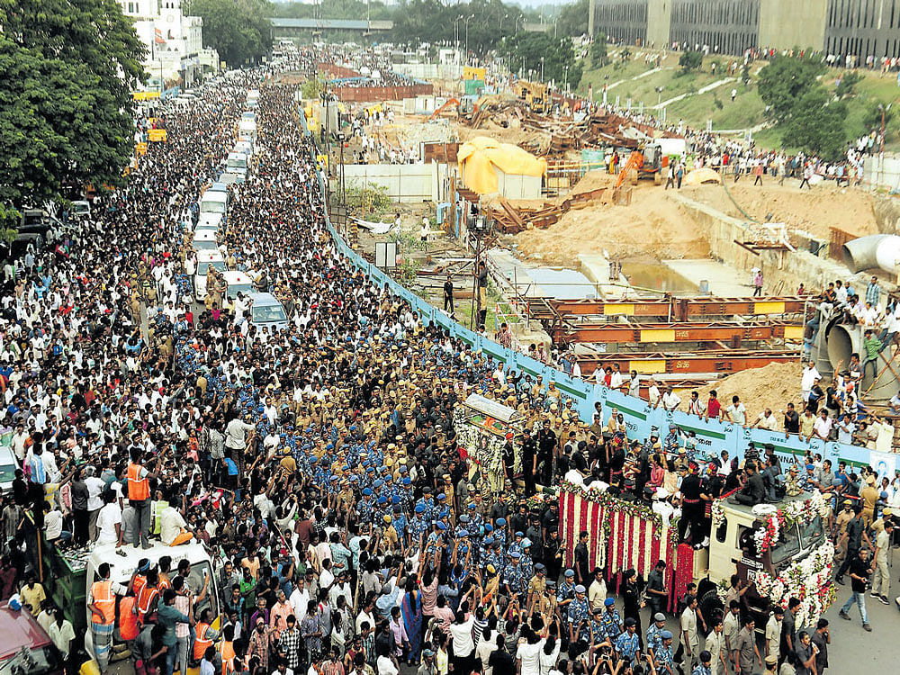 EMOTIONAL FAREWELL: A sea of people take part in the funeral procession in Chennai on Tuesday.