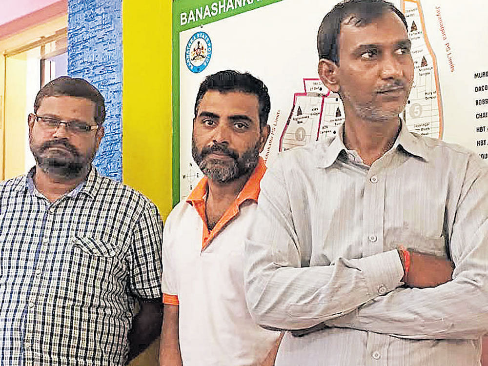 (From right) Dismissed constable Murugappa N Kumbar with his accomplices, Abubakar and Amar Singh. DH PHOTO