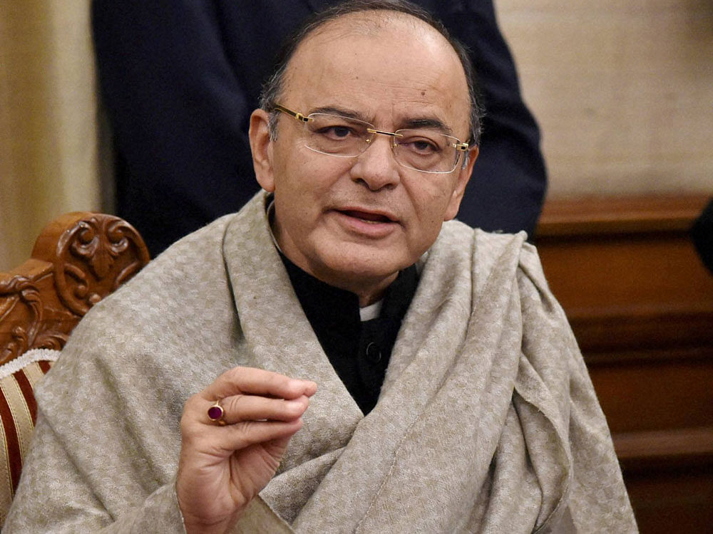 Finance Minister Arun Jaitley addresses a press conference in New Delhi on Thursday. PTI