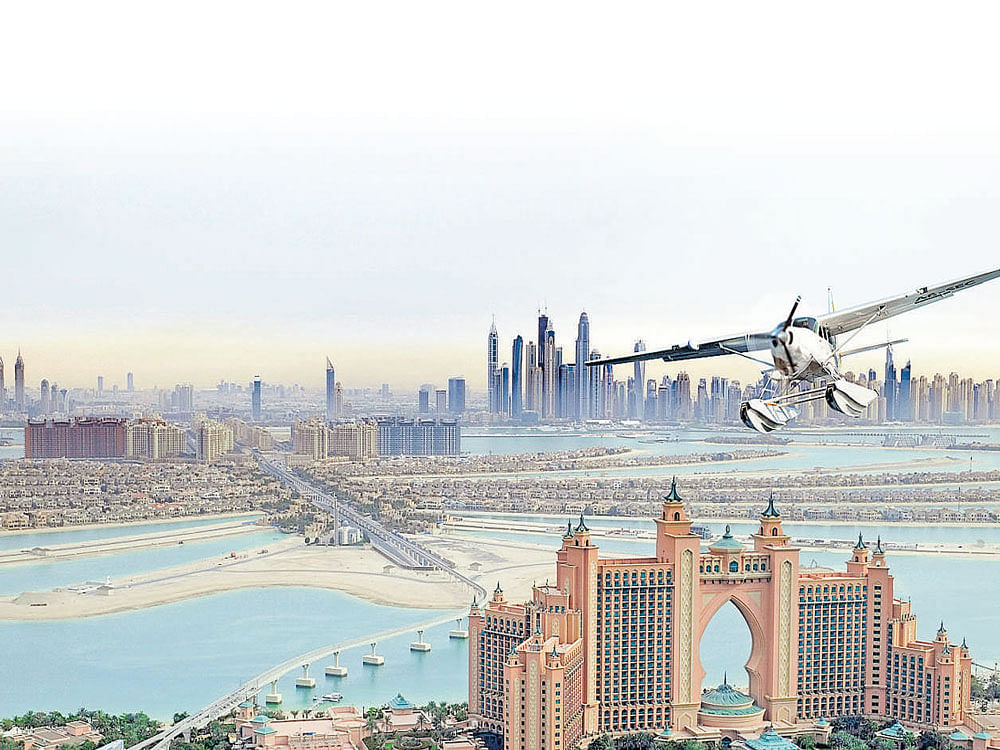 fancy flights Seaplane tours offer grand views of Dubai's cityscape.