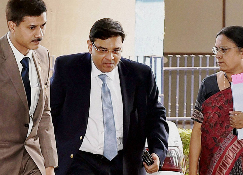 RBI Governor Urjit Patel arrives at Nabanna (State Secretariat) for a meeting with Chief Minister Mamata Banerjee in Kolkata on Thursday. PTI Photo