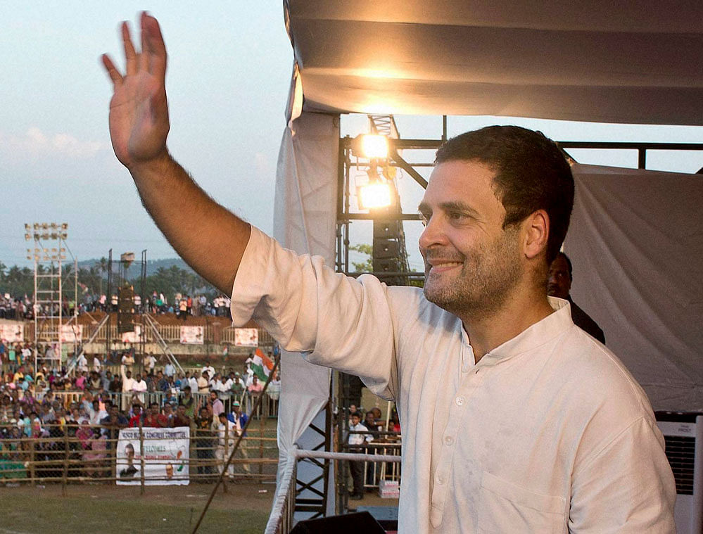 Congress Vice President Rahul Gandhi's waves to the crowd during his Padyatra from Holy Sprit Church to Fatorda Ground at Margaon in Goa on Friday. PTI Photo