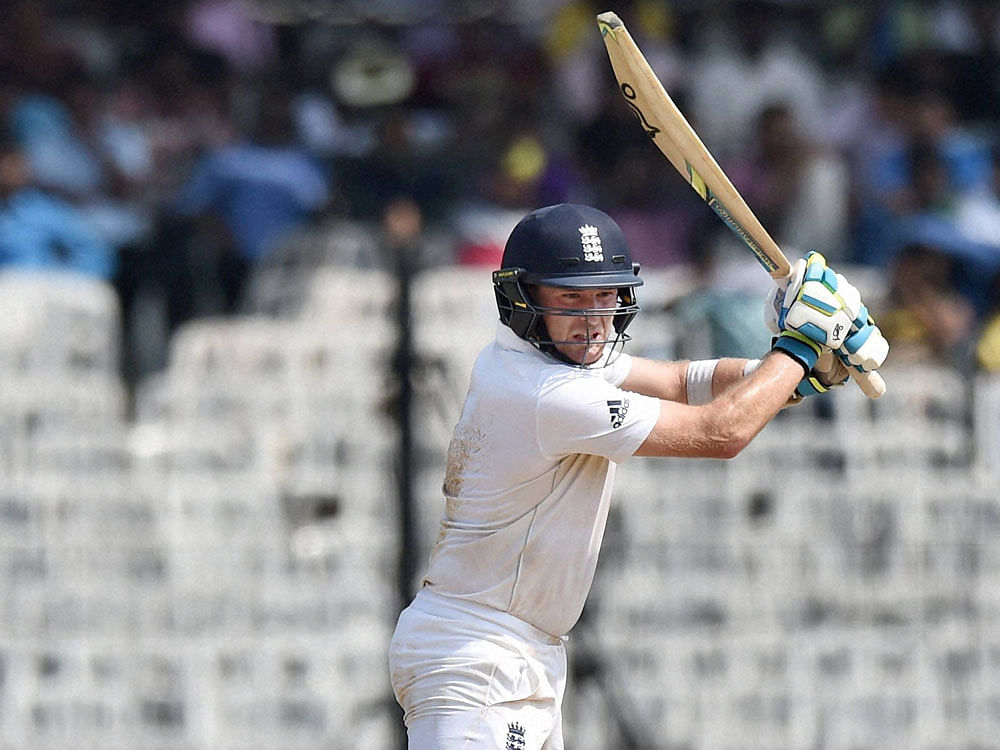 England's Liam Dawson cuts one to the boundary during his unbeaten 66 on Saturday. PTI