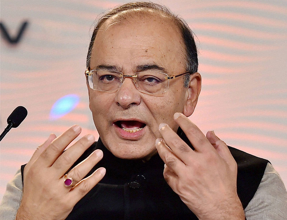 Finance Minister Arun Jaitley today said the government's decision to tweak the presumptive income norms would reduce the tax liability by up to 30 per cent for those small traders opting for digital transactions. PTI Photo