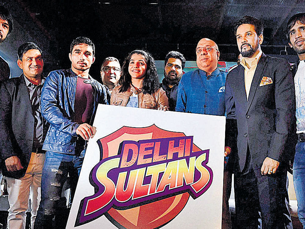 ALL SET Olympic bronze medallist Sakshi Malik (centre) and BCCI chief Anurag Thakur (second from right) were present at the launch of the Delhi Sultans' logo. PTI