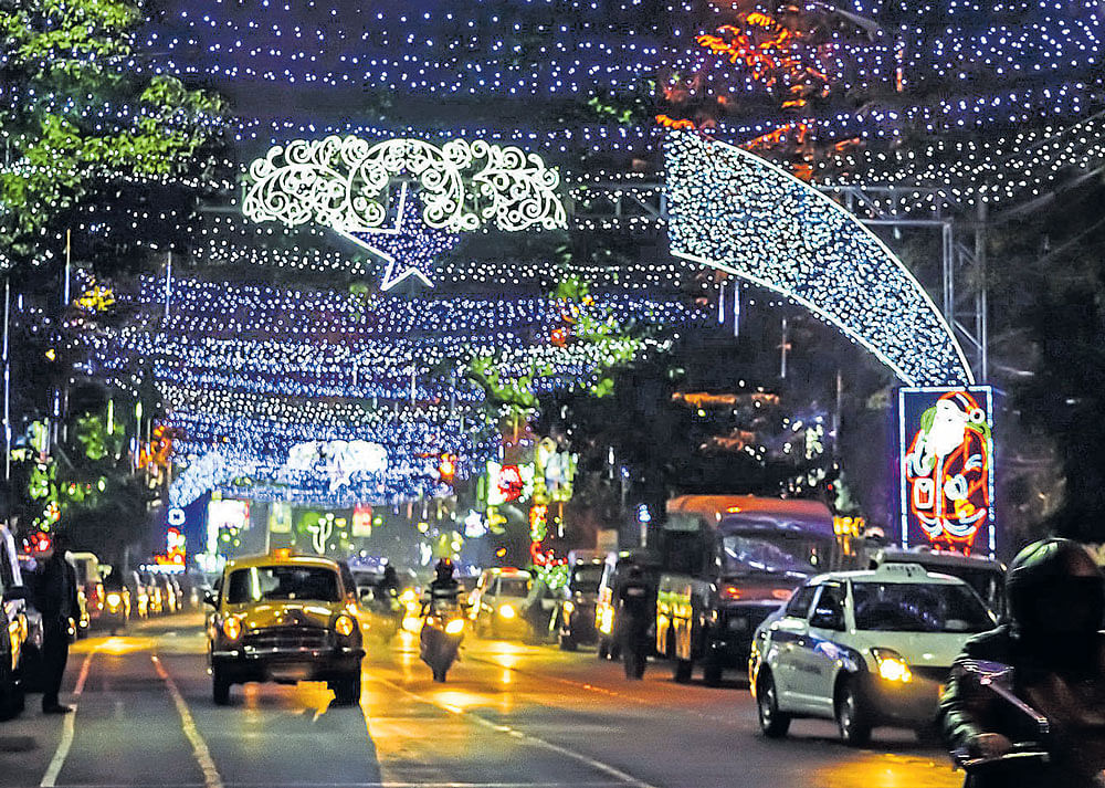 vibrant (Clockwise from top) Park Street in Kolkata opens to much fanfare during Christmas; confectionery outlets Flurys and Nahoum offer Christmas specialities, and are people's favourites Photo by author