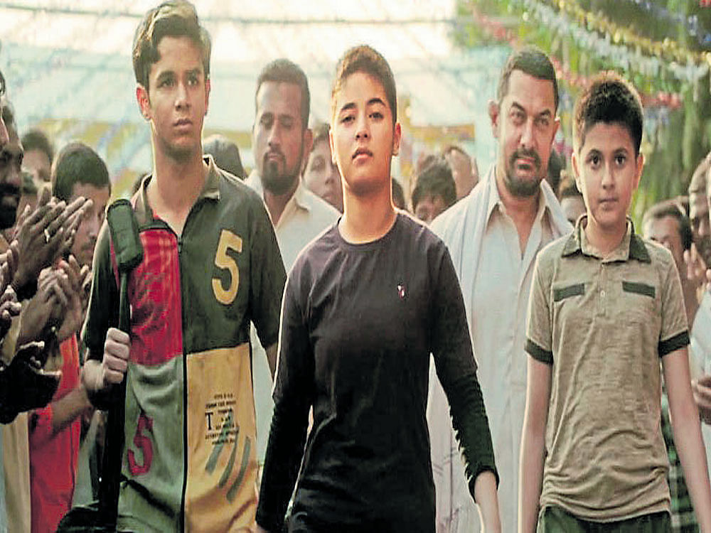 Aamir Khan-starrer wrestling drama film 'Dangal' has entered the Rs 100 crore club. Movie poster