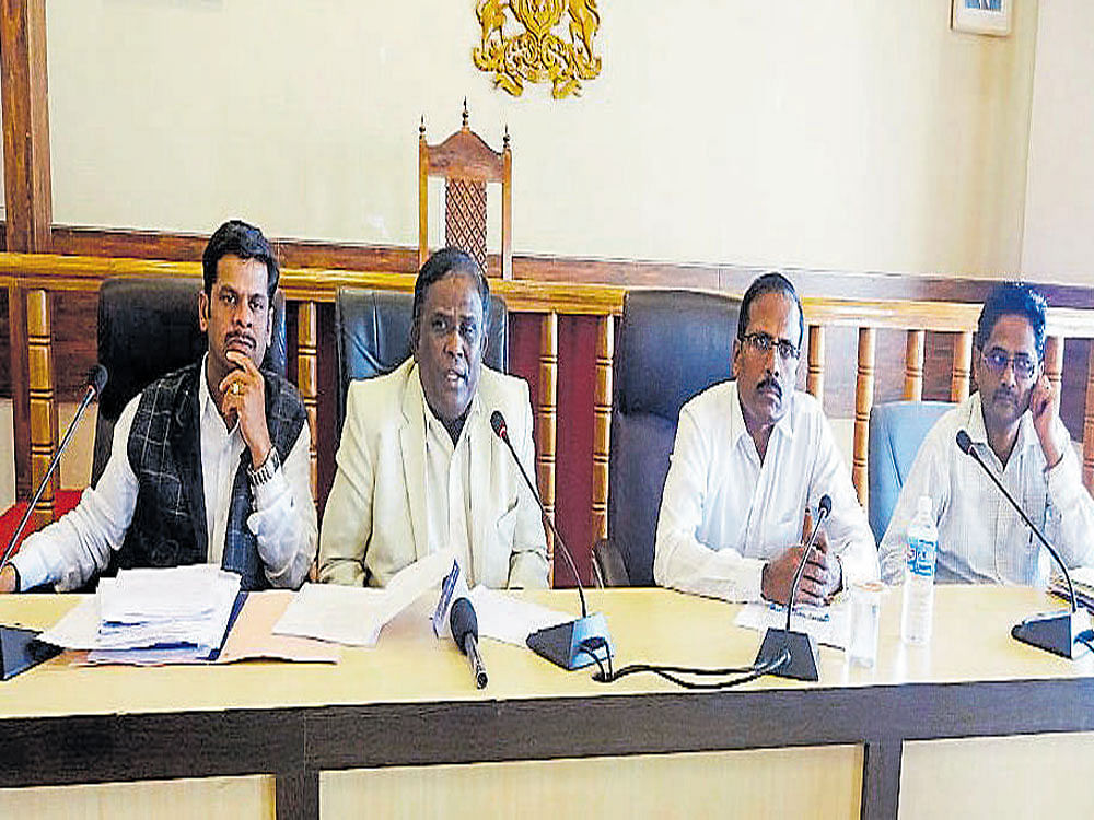 Karnataka Scheduled Castes and Scheduled Tribes Commission Chairman A Muniyappa speaks during a meeting on Diddalli issue, at Dc's office in Madikeri on Monday.