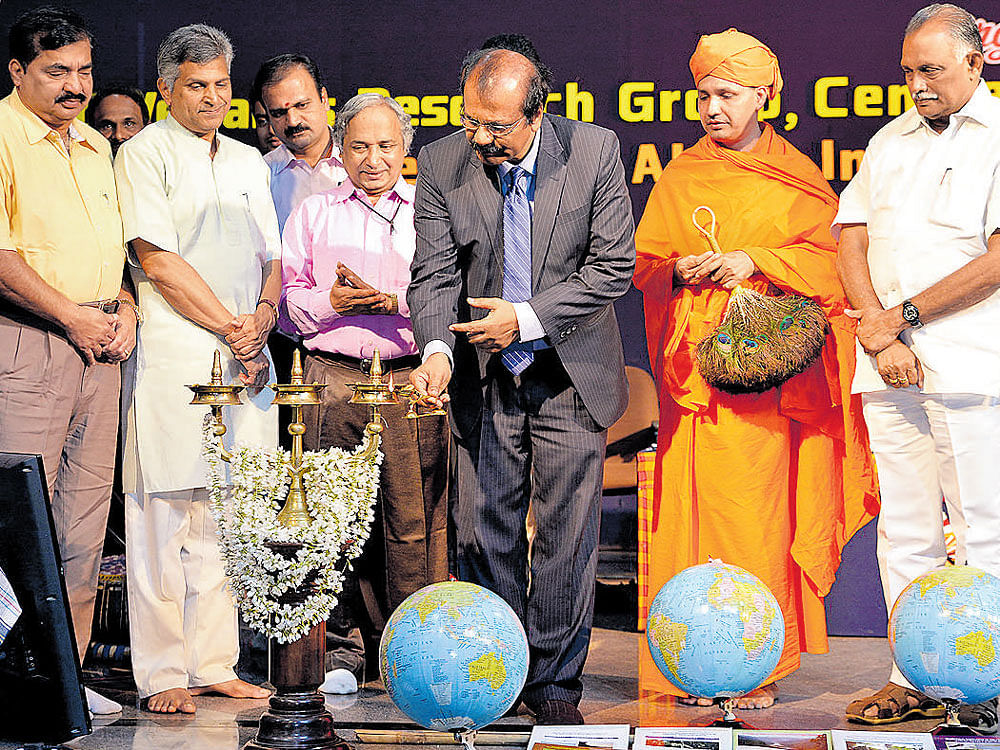 Mangalore University Vice Chancellor Prof K Byrappa inaugurates the international conference on
