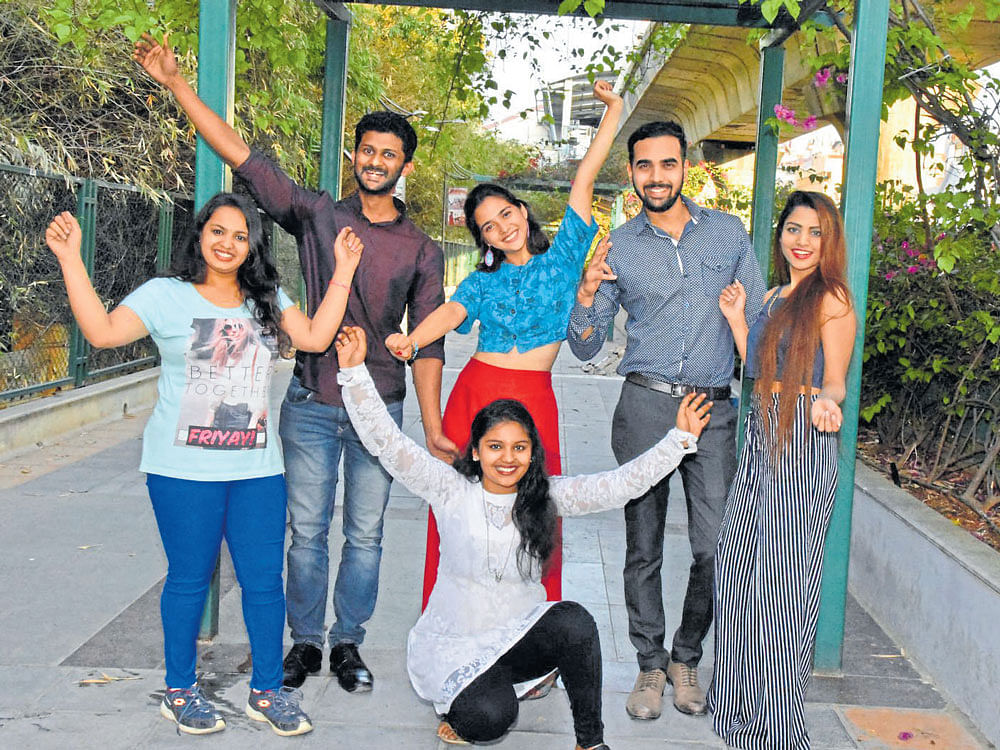 looking forward Youngsters in the city are making interesting resolutions for the New Year. (From left, standing) Dimple Jain, Cebush Jose, Natasha Carroll, Roshan Khan and Swara Singh. (Squatting) Sanjitha Madhu. DH PHOTO BY B K JANARDHAN